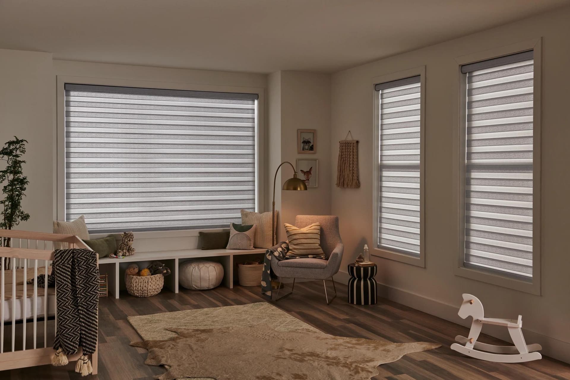 Alternating banded shades adding texture to a living room window
