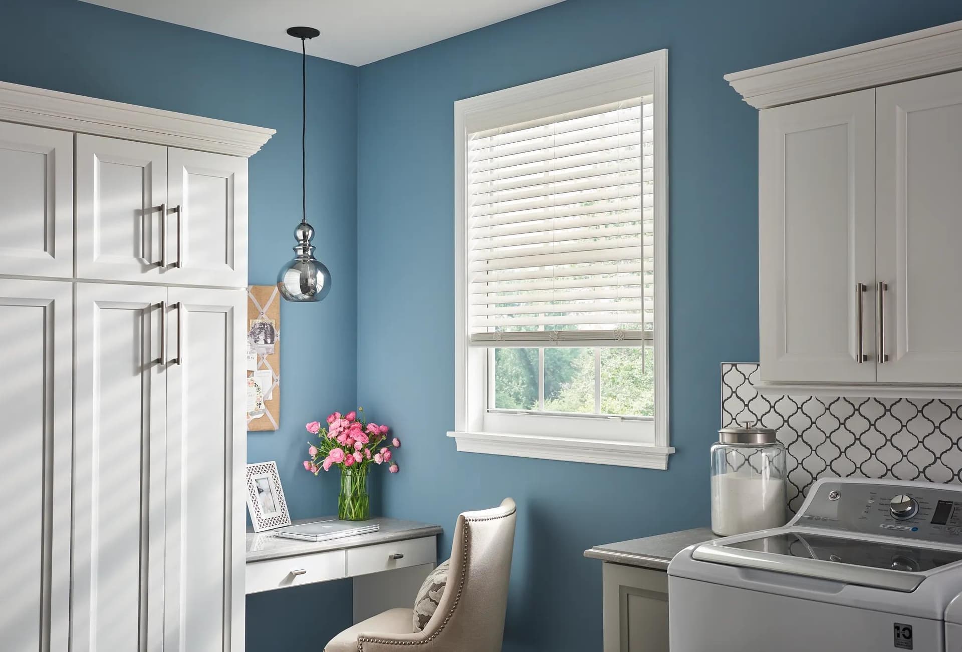 Warm faux wood blinds in a master bedroom suite