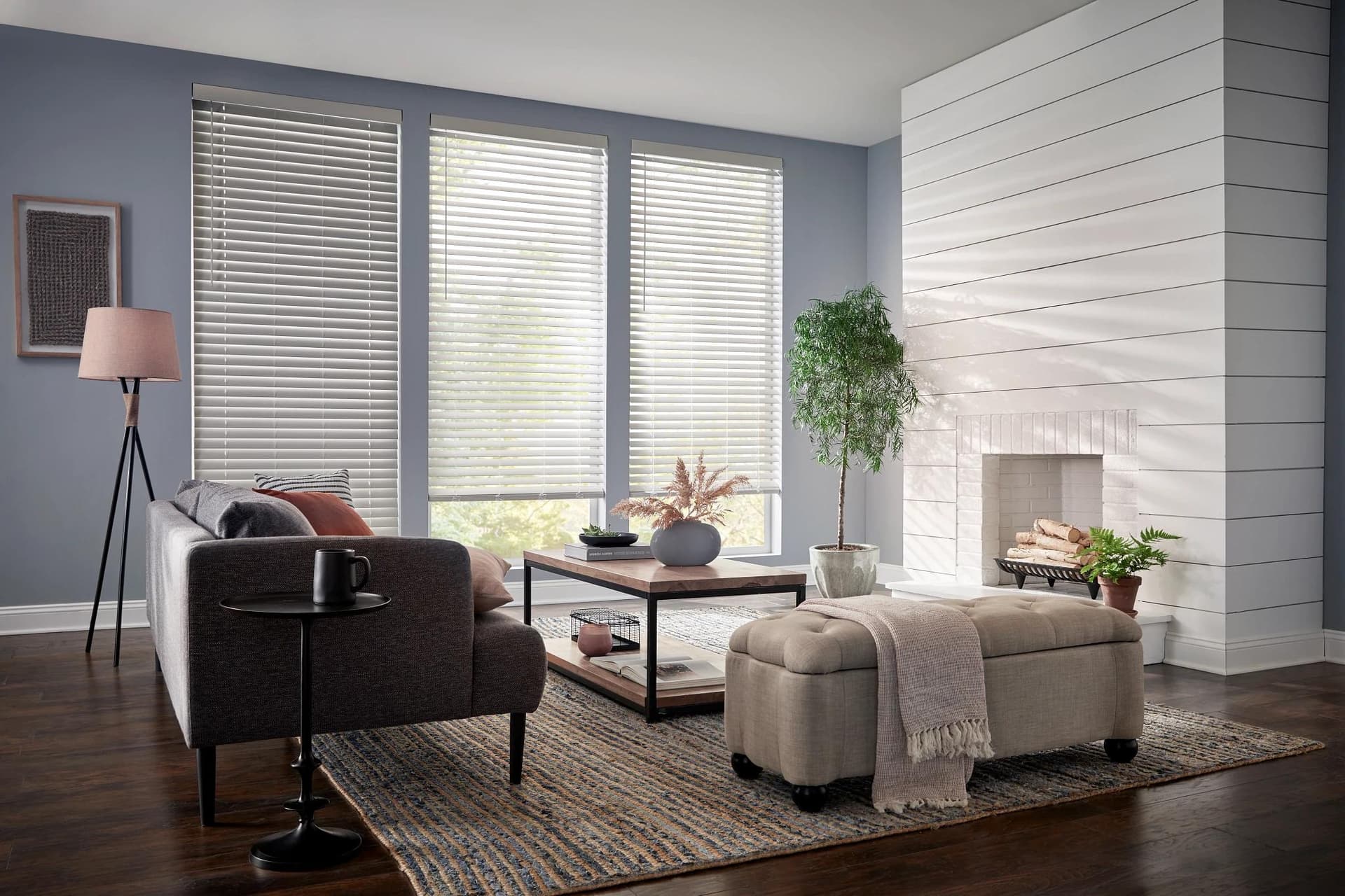 Durable faux wood blinds finishing out a bright living room
