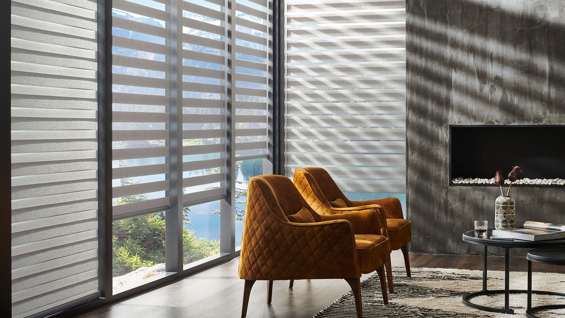 Remote-operated shades tucked neatly into a bright bedroom