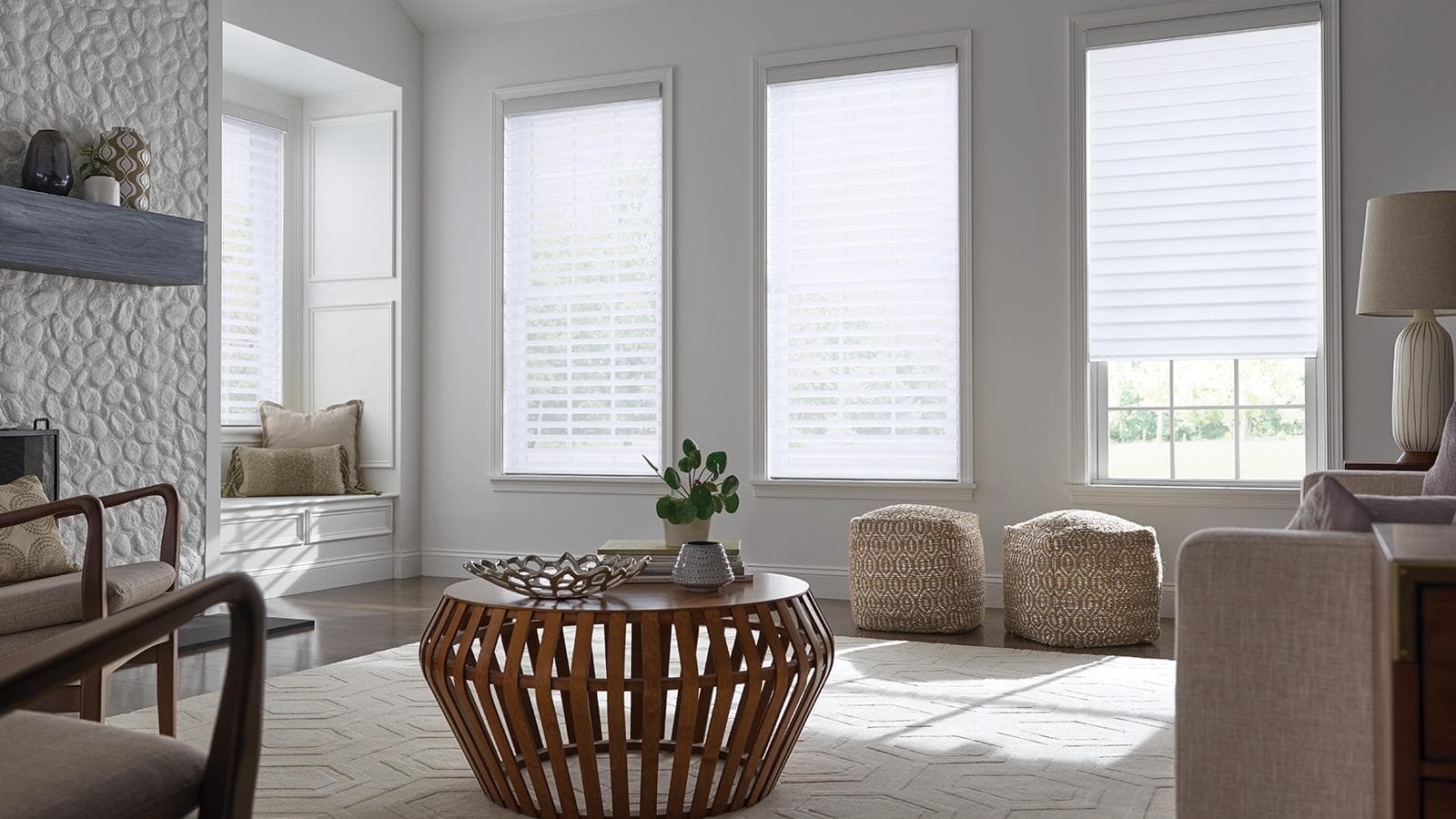 Soft sheer shadings filtering morning light in a bedroom